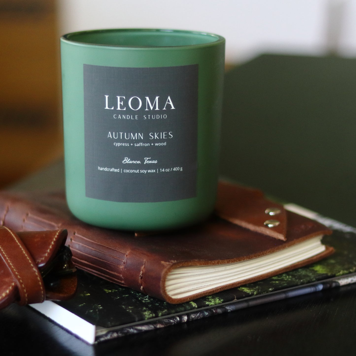 Handcrafted eco-friendly scented candle. Natural coconut & soy wax, toxin-free, 100% cotton wicks. Olive vessel. Autumn Skies fall scent.