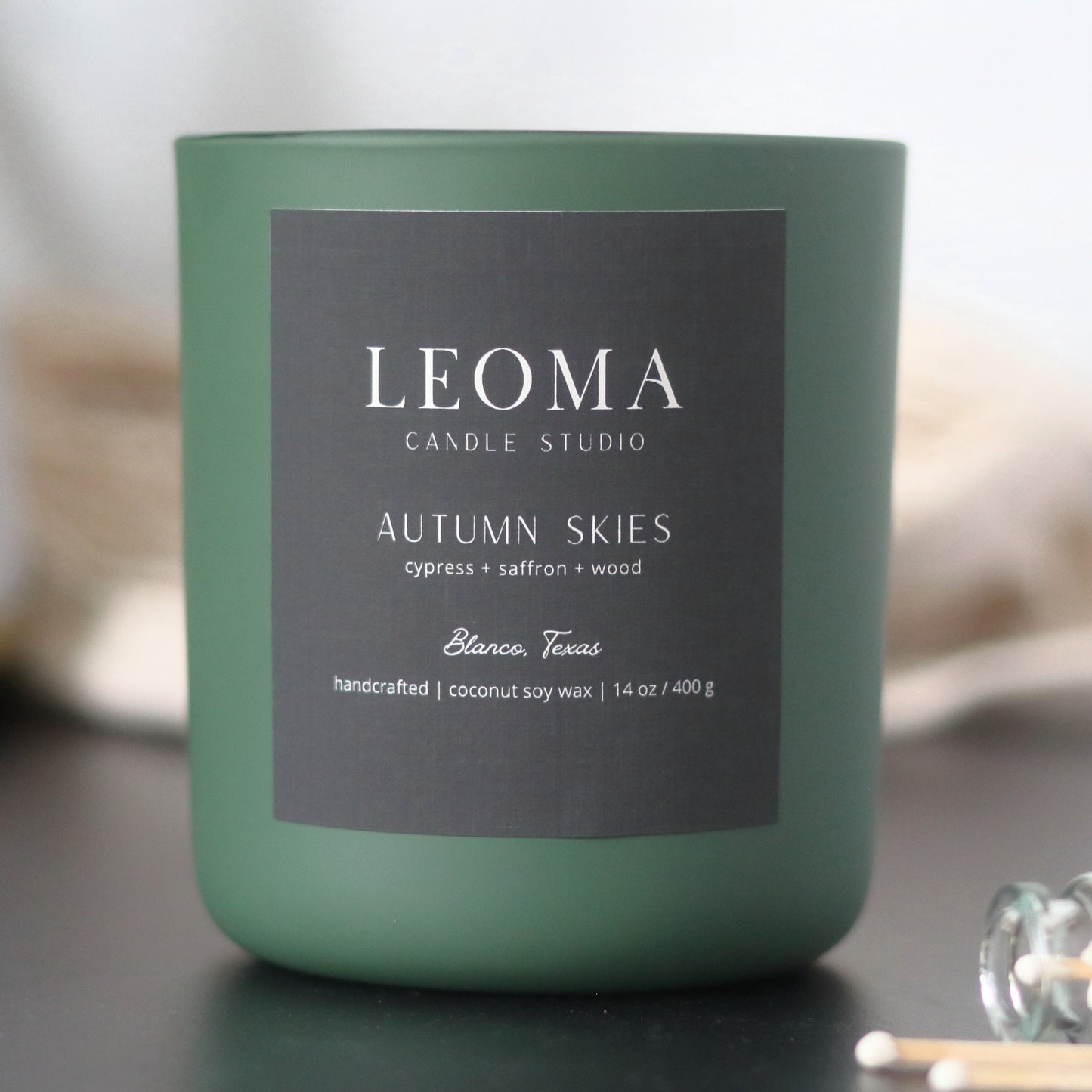 Handcrafted eco-friendly scented candle. Natural coconut & soy wax, toxin-free, 100% cotton wicks. Olive vessel. Autumn Skies fall scent.