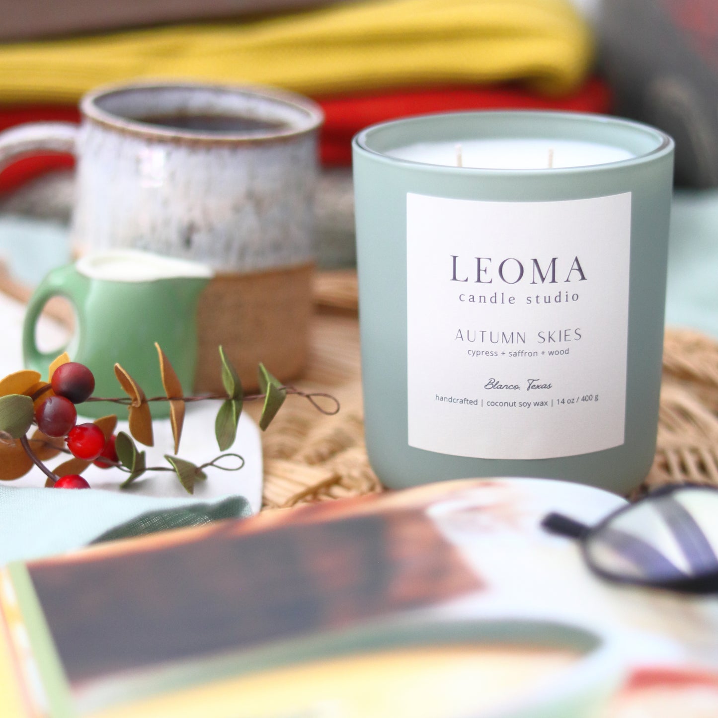 Handcrafted eco-friendly scented candle. Natural coconut & soy wax, toxin-free, 100% cotton wicks. Sage vessel. Autumn Skies fall scent.