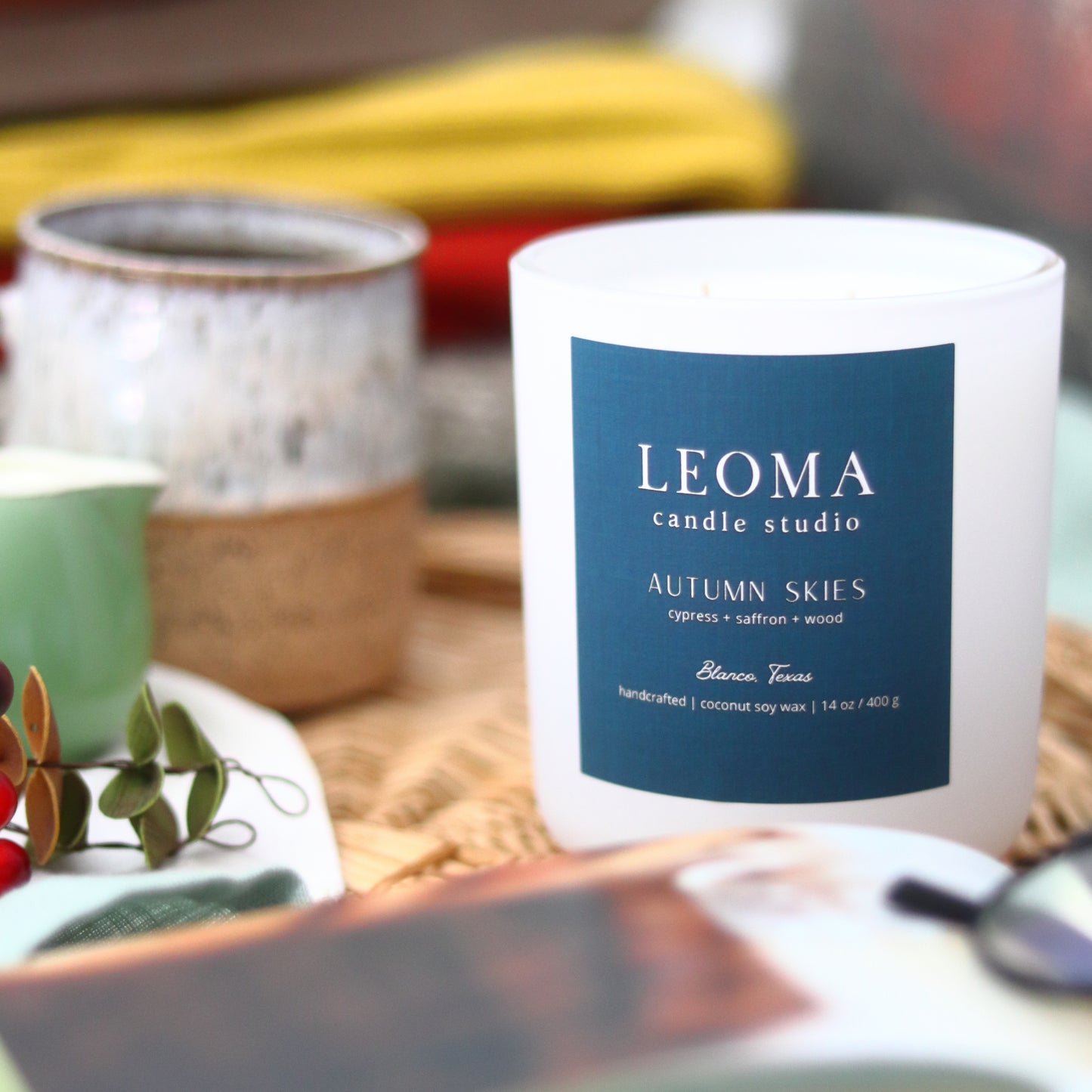 Handcrafted eco-friendly scented candle. Natural coconut & soy wax, toxin-free, 100% cotton wicks. White vessel. Autumn Skies fall scent.