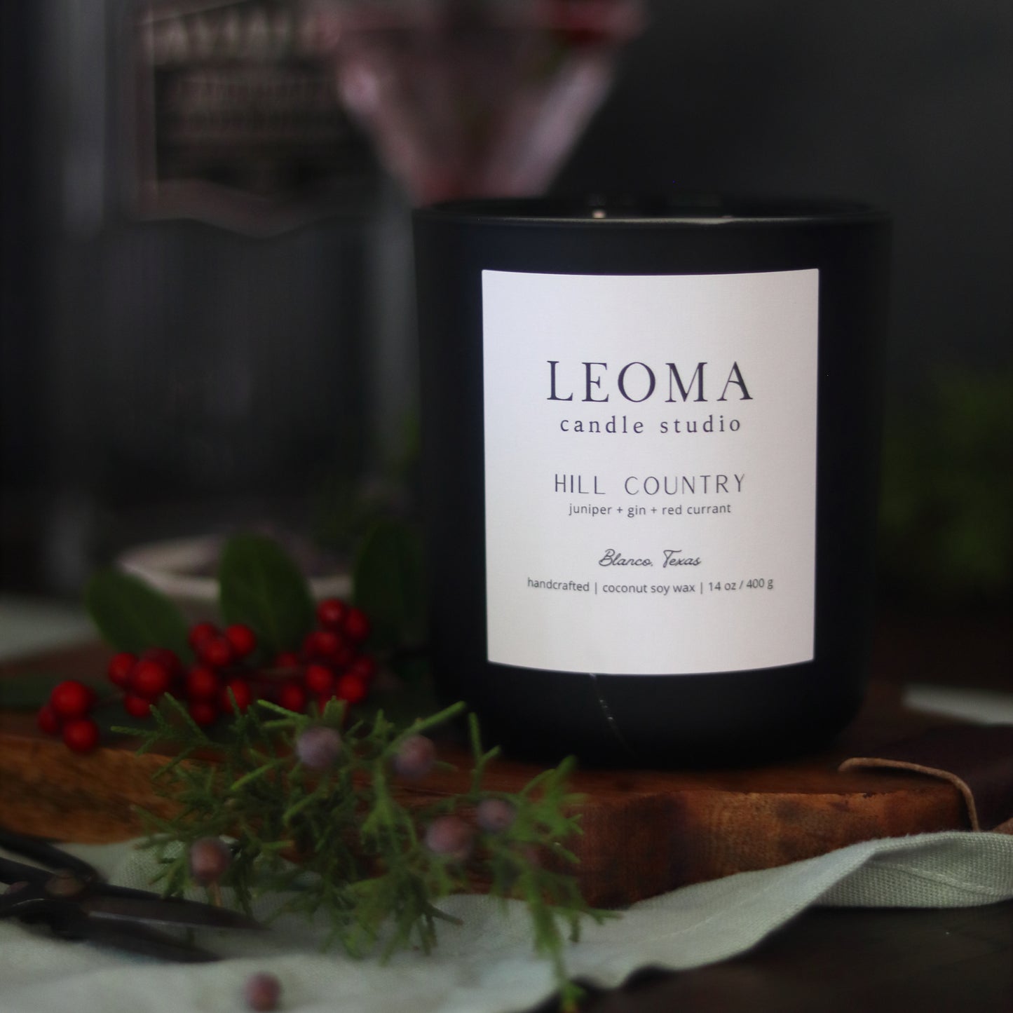 Handcrafted eco-friendly scented candle. Natural coconut & soy wax, toxin-free, 100% cotton wicks. Black vessel. Hill Country scented.