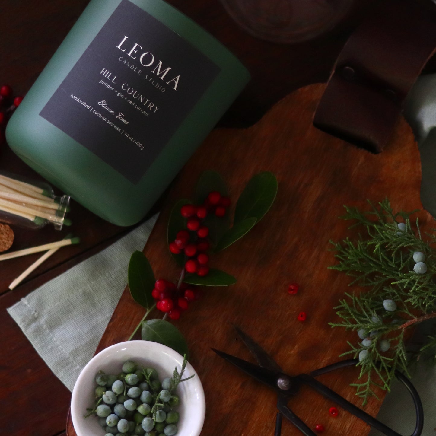 Handcrafted eco-friendly scented candle. Natural coconut & soy wax, toxin-free, 100% cotton wicks. Olive vessel. Hill Country scented.