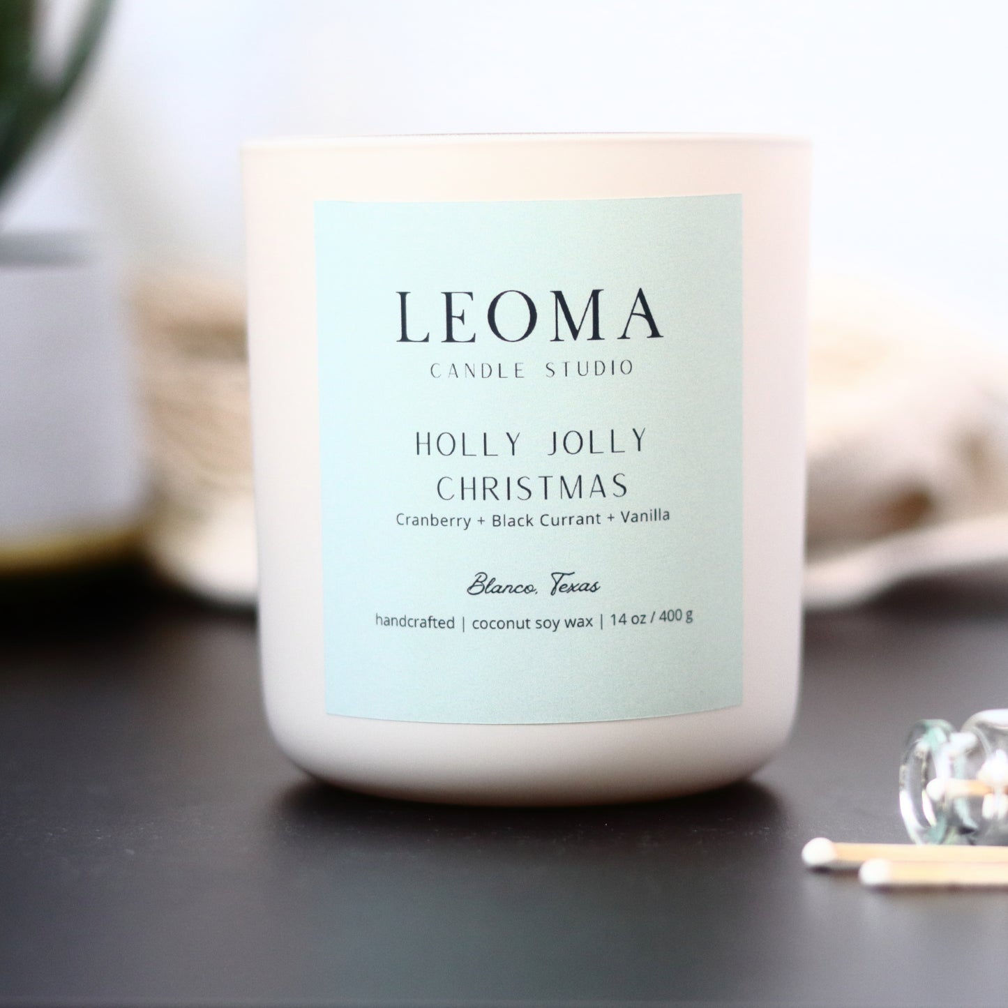 Handcrafted eco-friendly scented candle. Natural coconut & soy wax, toxin-free, 100% cotton wicks. Cream vessel. Holly Jolly Christmas scented.