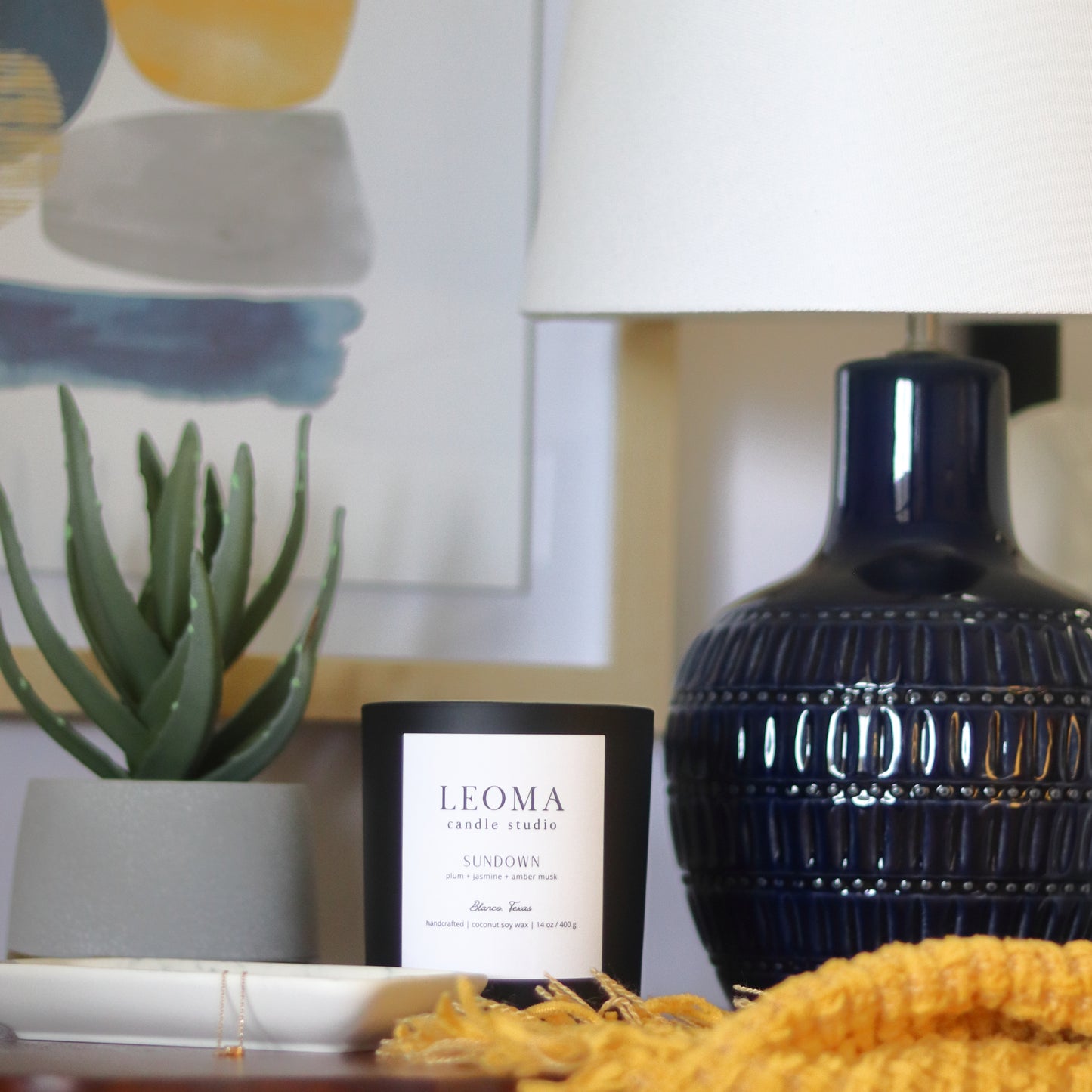 Handcrafted eco-friendly scented candle. Natural coconut & soy wax, toxin-free, 100% cotton wicks. Black vessel. Sundown scented.