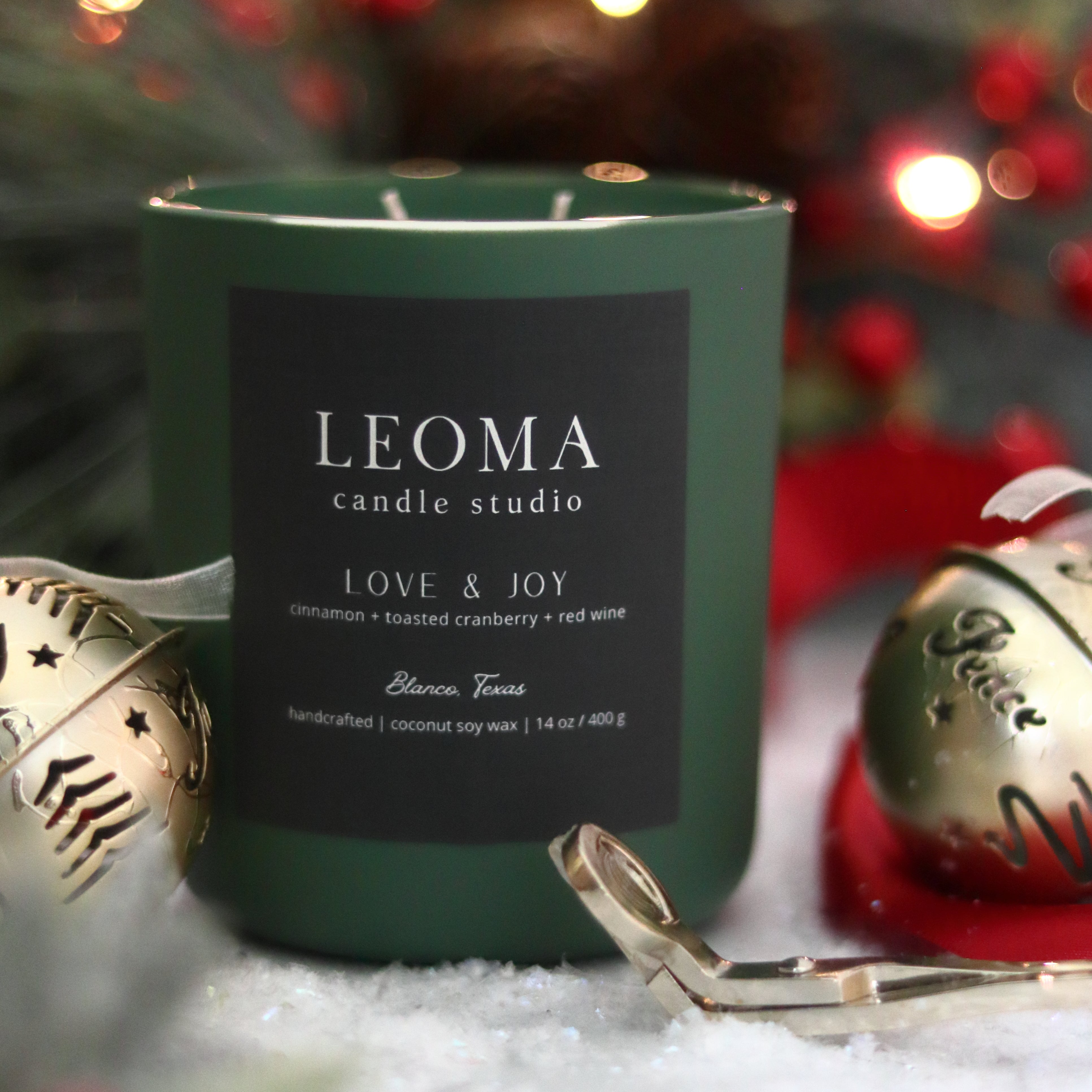 Handcrafted eco-friendly scented Christmas candle. Natural coconut & soy wax, toxin-free, 100% cotton wicks. Olive vessel. Love & Joy scent.
