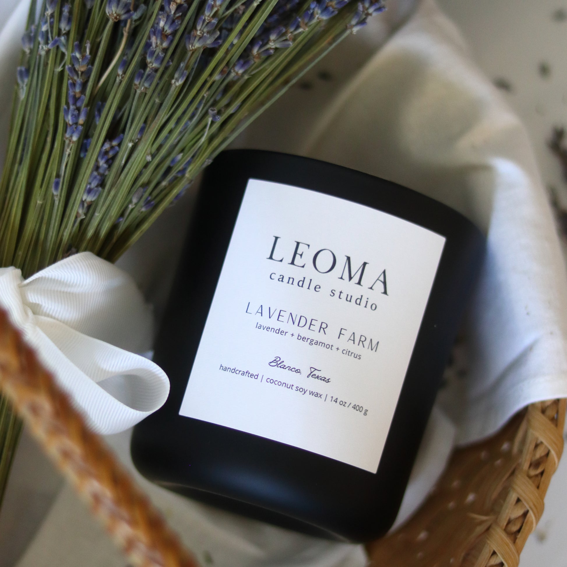 Handcrafted eco-friendly scented candle. Natural coconut & soy wax, toxin-free, 100% cotton wicks. Black vessel. Lavender Farm classic scented.
