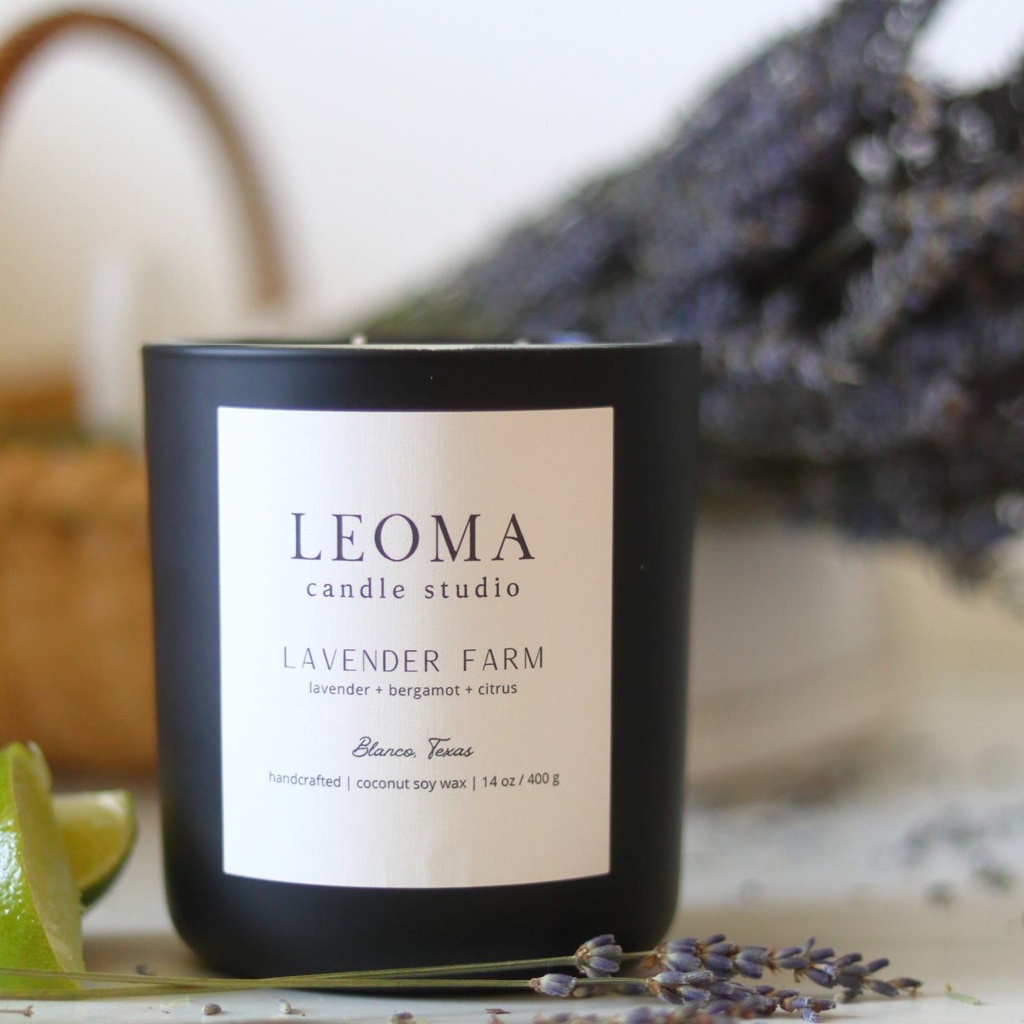 Handcrafted eco-friendly scented candle. Natural coconut & soy wax, toxin-free, 100% cotton wicks. Black vessel. Lavender Farm classic scented.
