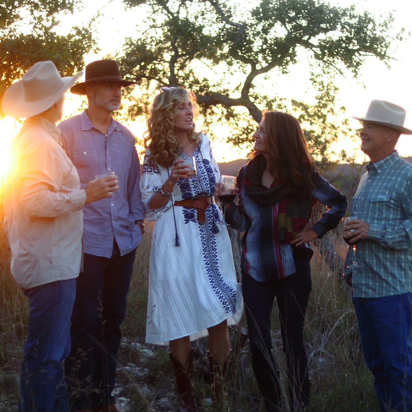 Sundown scented candle dinner with wine and friends