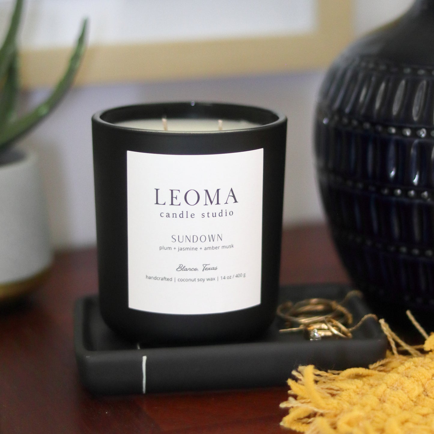 Handcrafted eco-friendly scented candle. Natural coconut & soy wax, toxin-free, 100% cotton wicks. Black vessel. Sundown scented.