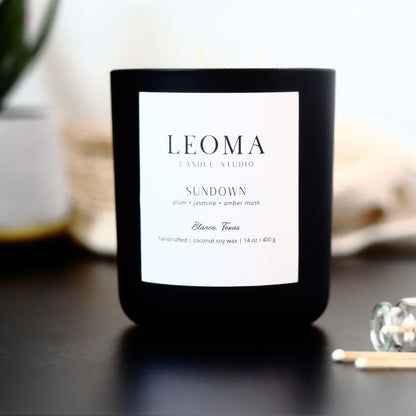 Handcrafted eco-friendly scented candle. Natural coconut & soy wax, toxin-free, 100% cotton wicks. Black vessel. Sundown scented.