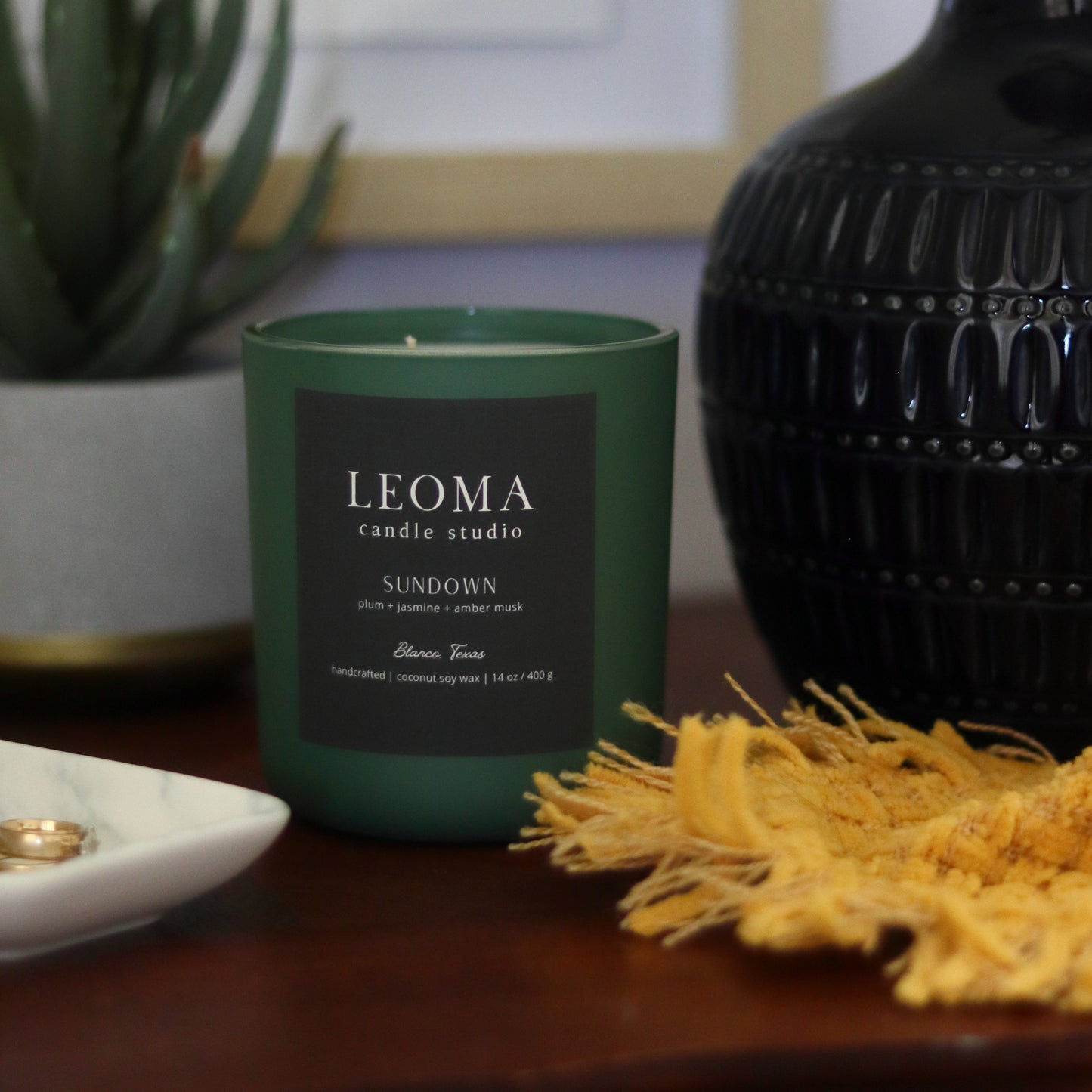 Handcrafted eco-friendly scented candle. Natural coconut & soy wax, toxin-free, 100% cotton wicks. Olive vessel. Sundown scented.
