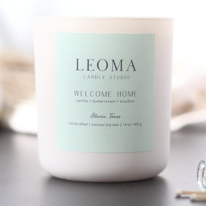 Handcrafted eco-friendly scented candle. Natural coconut & soy wax, toxin-free, 100% cotton wicks. Cream vessel. Welcome Home scented.