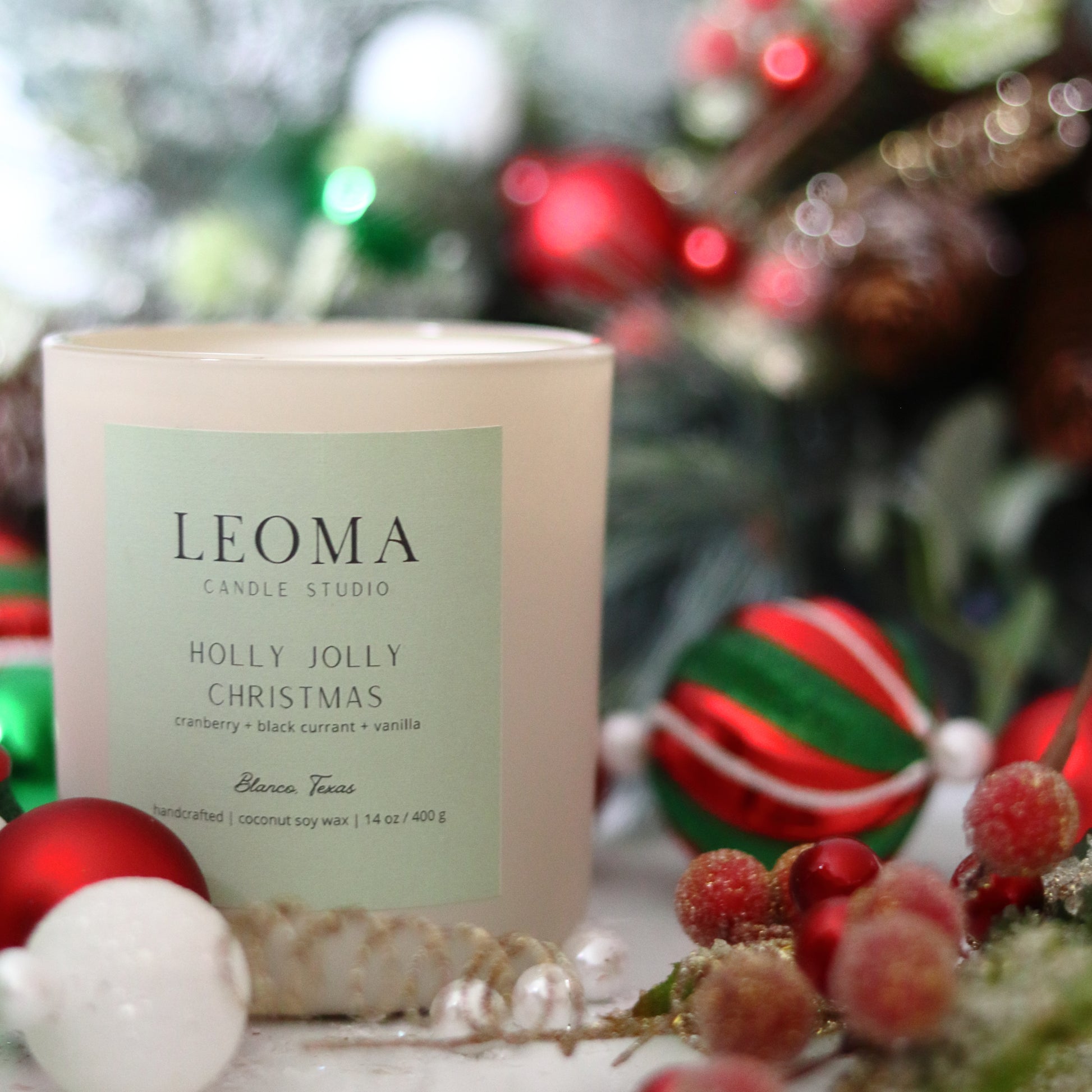 Handcrafted eco-friendly scented candle. Natural coconut & soy wax, toxin-free, 100% cotton wicks. Cream vessel. Holly Jolly Christmas scented.