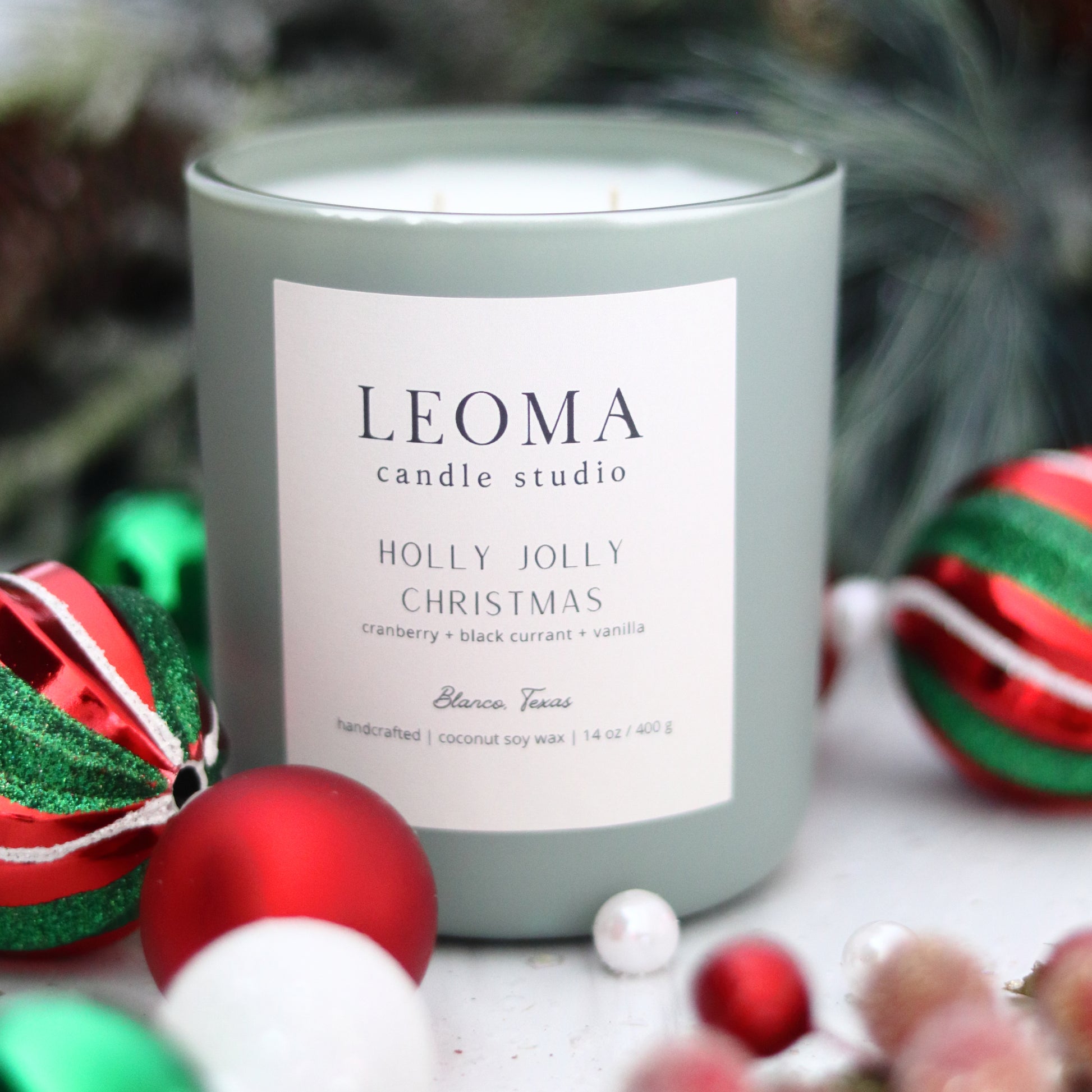 Handcrafted eco-friendly scented candle. Natural coconut & soy wax, toxin-free, 100% cotton wicks. Sage vessel. Holly Jolly Christmas scented.