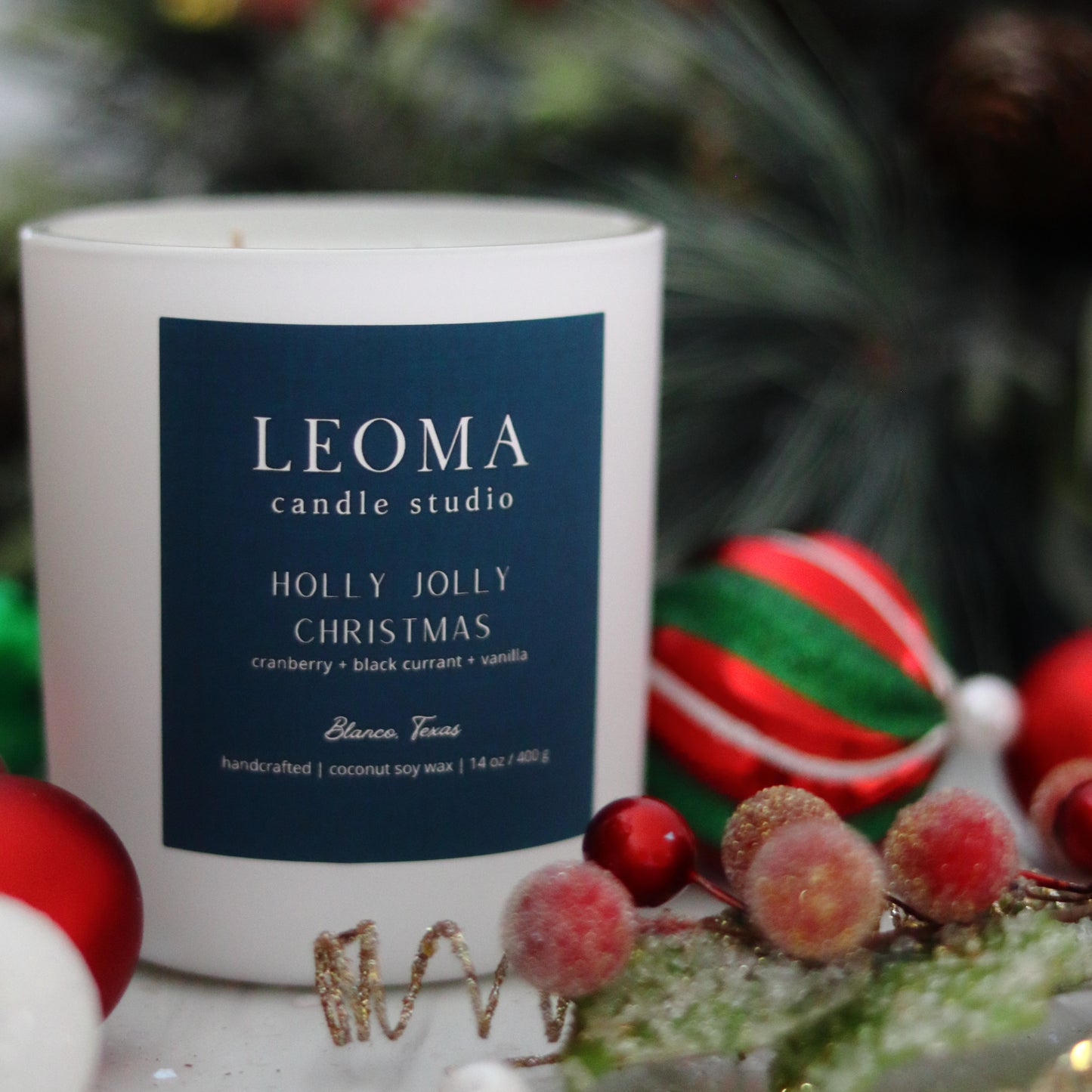 Handcrafted eco-friendly scented candle. Natural coconut & soy wax, toxin-free, 100% cotton wicks. White vessel. Holly Jolly Christmas scented.